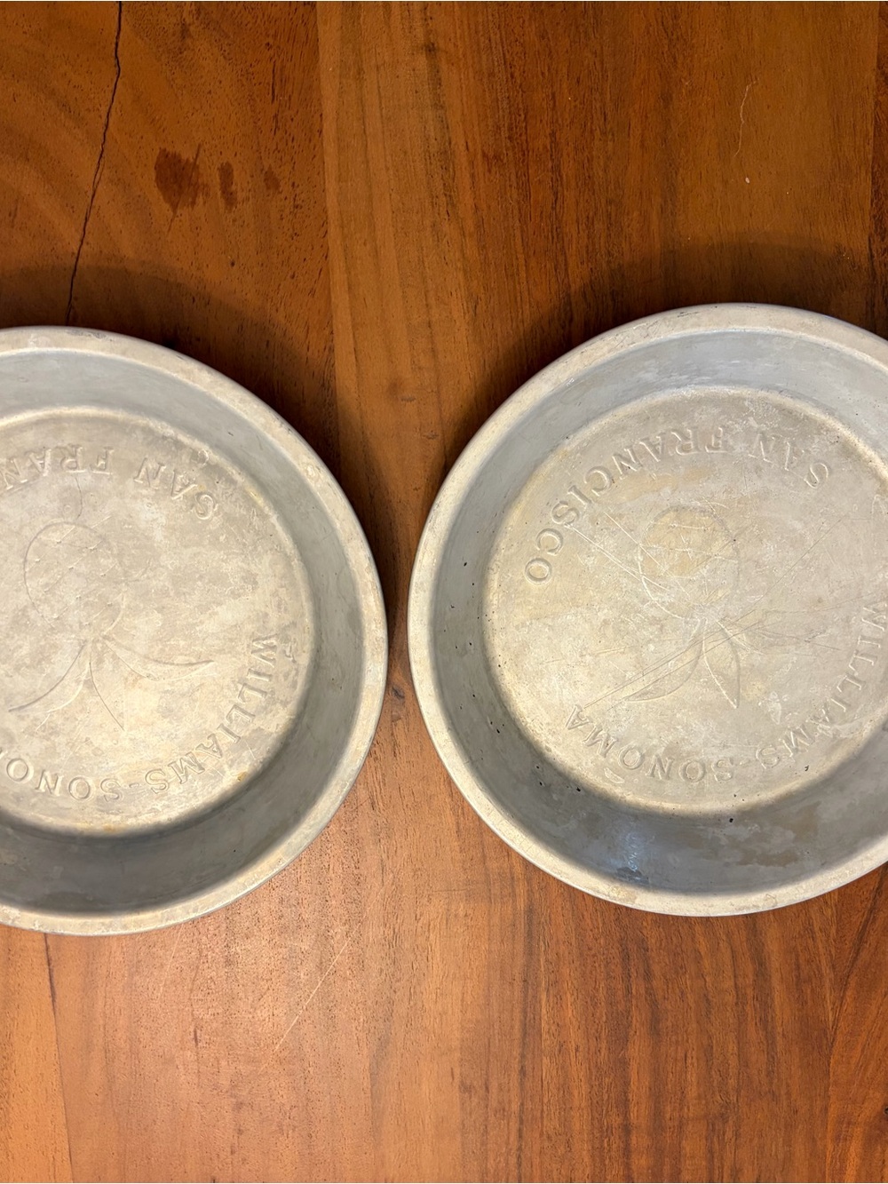 Williams Sonoma Pewter-Tone Round deep pie plates set of 2 with pineapple